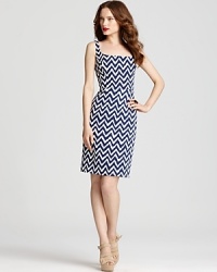 A navy chevron print on this Milly sheath dress lends sophisticated charm to your workdays--and after-hour adventures. A navy chevron print on this Milly sheath dress lends sophisticated charm to your workdays--and after-hour adventures.