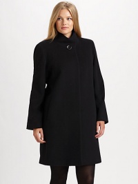 Simply elegant and made from fine Italian fabrication, a stand-collar coat with classic princess seams, convenient pockets and a universally flattering A-line silhouette.Button closure at stand collarPrincess seamsSlash pocketsFully linedAbout 36 from shoulder to hemWool/angora/nylonDry cleanImported of Italian