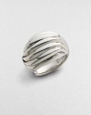 A high fluted dome of sterling silver is effortlessly chic.Sterling silver Imported