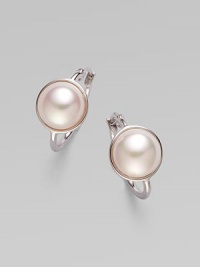 Glistening mabe pearl faceted in sterling silver makes for a timeless design. 10mm mabe pearl Sterling silver Drop, about ½ Ear wire back Made in Spain 