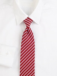 Some things are timeless, and this classic tie, woven in Italian silk with contrast stripes, is one of them. About 3 wideSilkDry cleanMade in Italy