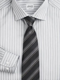 A sartorial standard in beautifully crafted, striped Italian silk. Silk Dry clean Made in Italy 