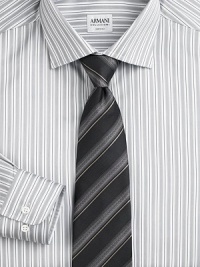 A sartorial standard in beautifully crafted, striped Italian silk. Silk Dry clean Made in Italy A sartorial standard in beautifully crafted, striped Italian silk. Silk Dry clean Made in Italy