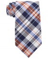 Give any solid shirt a preppy punch with this crisp plaid tie from Nautica.