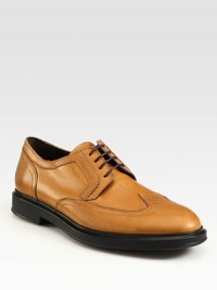 Classic derby lace-up with contemporary appeal, crafted in Italian calfskin leather with contrasting rubber soles and signature stitch detail.Leather upperLeather liningPadded insoleRubber soleMade in Italy Classic derby lace-up with contemporary appeal, crafted in Italian calfskin leather with contrasting rubber soles and signature stitch detail.Leather upperLeather liningPadded insoleRubber soleMade in Italy