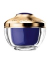 The neck and décolleté are, after the face, the two zones that are the most sensitive to the effects of aging. Because the skin is naturally thinner, the neck and décolleté are prime targets for the premature appearance of wrinkles and pigmentation flaws. The Orchidée Impériale Neck and Décolleté Cream is a rich creme that redefines and enhances the delicate neck and décolleté area. Its re-densifying action is reinforced by a double anti-slackening effect. After the treatment, the neck and décolleté appear immediately smoothed, as if lifted. Spots are diminished and the décolleté recovers a satiny radiance. With continued use, the skin recovers its strength and tone; it appears denser, stronger, and firmer.