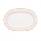 The Samarkand bone china collection by Villeroy & Boch combines stylish, exotic elements with timeless elegance. Precious golden bands and chains decorate this pure white bone china pattern. Warm ivory tones add a harmonious touch. Mix and match with coordinating Mosaic-designed pieces for a look that is truly your own.