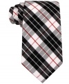 Stay on-target with tartan and this Tommy Hilfiger silk tie.