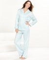 Classic style pairs with sublime comfort on these pajamas by Miss Elaine. The softest brushed back satin caresses your skin from the interior of this top and pajamas pants set.