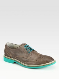 Step into the limelight in this modern update on a classic wingtip oxford, rendered in fine leather with contrasting sole and lace-up detail.Leather upperLeather liningPadded insoleRubber soleImported Step into the limelight in this modern update on a classic wingtip oxford, rendered in fine leather with contrasting sole and lace-up detail.Leather upperLeather liningPadded insoleRubber soleImported
