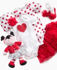 A little poof of bright red makes these a pair of super sweet socks from Baby Starters. A little poof of bright red makes these a pair of super sweet socks from Baby Starters.