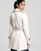 Bring a classic finish to your everyday looks with this perennial trench from Marc New York.