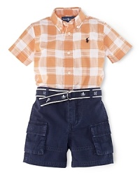 A perfectly preppy pairing for warmer weather, this classic ensemble features a plaid short-sleeved shirt, a rugged cotton ripstop cargo short and a mariner-inspired grosgrain belt to pull the look together. A perfectly preppy pairing for warmer weather, this classic ensemble features a plaid short-sleeved shirt, a rugged cotton ripstop cargo short and a mariner-inspired grosgrain belt to pull the look together.