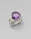 From the Infinity Collection. A softly hued, faceted amethyst in a setting formed of intertwining smooth bands and cables of sterling silver.AmethystSterling silverDiameter, about ½Imported