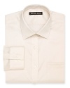 A regular fit Michael Kors non-iron dress shirt featuring a spread collar, barrel cuffs and a left chest pocket.
