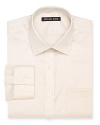 A regular fit Michael Kors non-iron dress shirt featuring a spread collar, barrel cuffs and a left chest pocket.