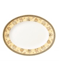 In 18th century England, Josiah Wedgwood, creator of the world famous Wedgwood ceramic ware, established a tradition of outstanding craftsmanship and artistry which continues today. The exotic India dinnerware pattern presents a pattern of exquisitely detailed, diminutive florals on a yellow and deep blue band against pure white bone china. Platter measures 15 1/4 L x 12 W. In 18th century England, Josiah Wedgwood, creator of the world famous Wedgwood ceramic ware, established a tradition of outstanding craftsmanship and artistry which continues today. The exotic India dinnerware pattern presents a pattern of exquisitely detailed, diminutive florals on a yellow and deep blue band against pure white bone china. Platter measures 15 1/4 L x 12 W.