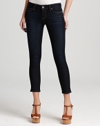 A super dark wash and slightly cropped silhouette lend a fresh, sophisticated edge to these Paige Denim skinny jeans.
