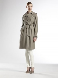 Italian wool, finished with classic trench tailoring.Foldover collarEpaulettesGunflapButton frontRaglan sleevesSelf beltSide slash pocketsBelted button cuffsRainflap92% wool/6% polyester/2% elastaneDry cleanMade in ItalyModel shown is 5'11 (180cm) wearing US size 4. Italian wool, finished with classic trench tailoring.Foldover collarEpaulettesGunflapButton frontRaglan sleevesSelf beltSide slash pocketsBelted button cuffsRainflap92% wool/6% polyester/2% elastaneDry cleanMade in ItalyModel shown is 5'11 (180cm) wearing US size 4.