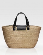 Woven straw design pairs with lustrous leather trim in this roomy carryall.Leather double top handles, 6 dropFlap-lock closureOne inside zip pocketFully lined13W X 11H X 5¼DMade in Italy