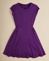 A classic fitted dress with a fun, flared skirt.