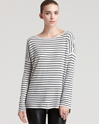 A Vince cashmere sweater is complete with a shirttail hem and stripes--for a casual look that inspires style confidence. A Vince cashmere sweater is complete with a shirttail hem and stripes--for a casual look that inspires style confidence.