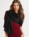 Hand-woven and hand-dyed cashmere/silk wrap reverses from a matte to a shine. Woven satin ball fringe 78L X 22W Imported