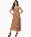 A vibrant-hued plaid lends seasonal appeal to Lauren by Ralph Lauren's feminine maxi dress, crafted with a cascade of ruffles at the skirt and delicate spaghetti straps.