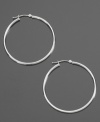 These delicate hoop earrings are the perfect compliment to your dressed-up style or everyday look. Crafted in 14k white gold. Approximate diameter: 3/8 inch.
