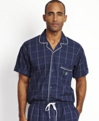 Top off your classic Sunday morning style with this short-sleeved windowpane camp shirt from Nautica. Top off your classic Sunday morning style with this short-sleeved windowpane camp shirt from Nautica.