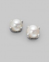 A sensual pearl, sparked with diamonds, exquisitely cradled in cabled sterling silver. White freshwater cultured pearls Diamonds, 0.05 tcw Sterling silver Diameter, about ½ Post back Imported