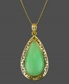 This exotic pendant features eye-catching teardrop-shaped jade set in 14k gold. Approximate length: 18 inches. Approximate drop: 1 inch.