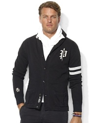 Drawing inspiration from vintage varsity sweaters, this long-sleeved shawl-collar cardigan is crafted from ultra-soft brushed fleece with bold embroidery for a heritage appeal. Drawing inspiration from vintage varsity sweaters, this long-sleeved shawl-collar cardigan is crafted from ultra-soft brushed fleece with bold embroidery for a heritage appeal.