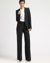 Smooth stretch wool pants with wide, straight legs.Wide waistband with hook-and-eye Belt loops Flat front with zip closure Inseam, about 35 96% virgin wool/4% elastane Dry clean Imported