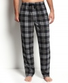 A cozy fleece fit and classic plaid design make these Perry Ellis PJ bottoms will have you sleeping in style.