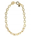 A modern link to classic style. This AK Anne Klein necklace boasts knot detail with ivory enamel. Crafted in gold tone mixed metal. Approximate length: 17 inches + 2-inch extender