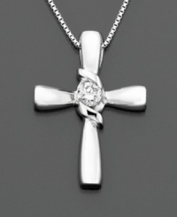 A single round-cut diamond (1/10 ct. t.w.) makes Sirena's cross pendant dazzle. Set in 14k white gold. Approximate length: 18 inches. Approximate drop: 1 inch. A single round-cut diamond (1/10 ct. t.w.) makes Sirena's cross pendant dazzle. Set in 14k white gold. Approximate length: 18 inches. Approximate drop: 1 inch.