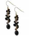 Embrace this pair of drop earrings from Kenneth Cole New York. Black beads wrap around the linear earrings crafted from gold-tone mixed metal. Approximate drop: 2-1/10 inches.