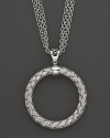 Multiple chains flank an intricately woven sterling silver circle. From Fifth Season by Roberto Coin