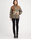 Channel the runway in this quilted coat with contrasting suede trim and a detachable corset panel for a dose of countryside-cool. Ribbed asymmetrical collarAsymmetrical zipperDetachable crossover panelLong sleevesRibbed cuffs and hemFully linedAbout 27 from shoulder to hemBody: 100% nylonTrim: Cotton/acrylic/suedeDry clean with leather specialistImportedModel shown is 5'10 (177cm) wearing US size 4. 