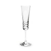 This stylish set of high-stemmed champagne flutes reinterprets a signature Baccarat pattern inspired by rice-grain cuts.
