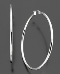 Glamourous sterling silver hoops are exactly what you need to add the finishing touch to your everyday look. These earrings measure approximately 1-3/4 inches in diameter. Glamourous sterling silver hoops are exactly what you need to add the finishing touch to your everyday look. These earrings measure approximately 1-3/4 inches in diameter.