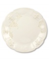With embossed lilies and golden leaves, Portmeirion's decorated Fleur de Lys dinner plate sets tables in the French tradition. Classic, scalloped stoneware in warm ivory lends distinct old-world elegance to everyday dining.