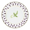 Frivole combines daring originality with soft feminity to create a sophisticated design for the table. Sprawling leaf-work designs add exuberant elegance to this whimsical pattern. Coordinating colors of amethyst and sage with gold trim allow versatility when entertaining formally or casually.