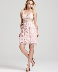 Sue Wong's cocktail dress is in full bloom for the season. Triangle top styling with beaded midriff and full petal skirt. Wear the petals with the metal t-straps. Sue Wong's cocktail dress is in full bloom for the season. Triangle top styling with beaded midriff and full petal skirt. Wear the petals with the metal t-straps.