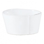 An effortless collection that transitions seamlessly from your kitchen to the table, these exceptional serving dishes solidify your presentation with down-to-earth elegance. Crafted in Tuscany from Italian stoneware, and featuring unique, rustic shapes with modern details, these pieces are built to last, both in terms of style and functionality.