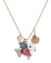 Betsey Johnson's deep-blue-sea pendant combines a pink and white fish with crystal accents and gold tone details with a gold tone seashell, turquoise starfish and small crystal heart. Crafted in antique gold tone mixed metal. Approximate length: 16 inches + 3-inch extender. Approximate drop length: 1-1/4 inches. Approximate drop width: 1-1/4 inches. Betsey Johnson's deep-blue-sea pendant combines a pink and white fish with crystal accents and gold tone details with a gold tone seashell, turquoise starfish and small crystal heart. Crafted in antique gold tone mixed metal. Approximate length: 16 inches + 3-inch extender. Approximate drop length: 1-1/4 inches. Approximate drop width: 1-1/4 inches.