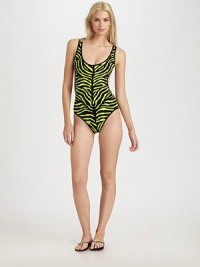 Wild style courtesy of a neon zebra print and sexy cutout sides and back.ScoopneckFully lined83% nylon/17% spandexHand washImported Wild style courtesy of a neon zebra print and sexy cutout sides and back.ScoopneckFully lined83% nylon/17% spandexHand washImported