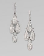 Four shimmering teardrops set with crystals, graphically arranged.Crystal Rhodium plated Drop, about 2 Post-and-hinge back Imported