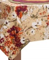 A painted, modern spread of lush wildflowers adorns Vera's Flowering Branch round tablecloth, creating an ideal backdrop for casual entertaining anytime. (Clearance)